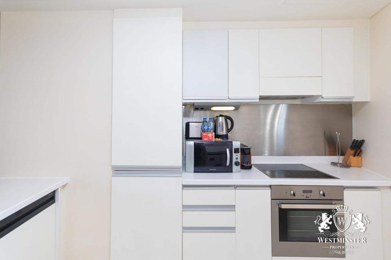Westminster Dubai Mall Exteriör bild A typical kitchen in a Westminster apartment