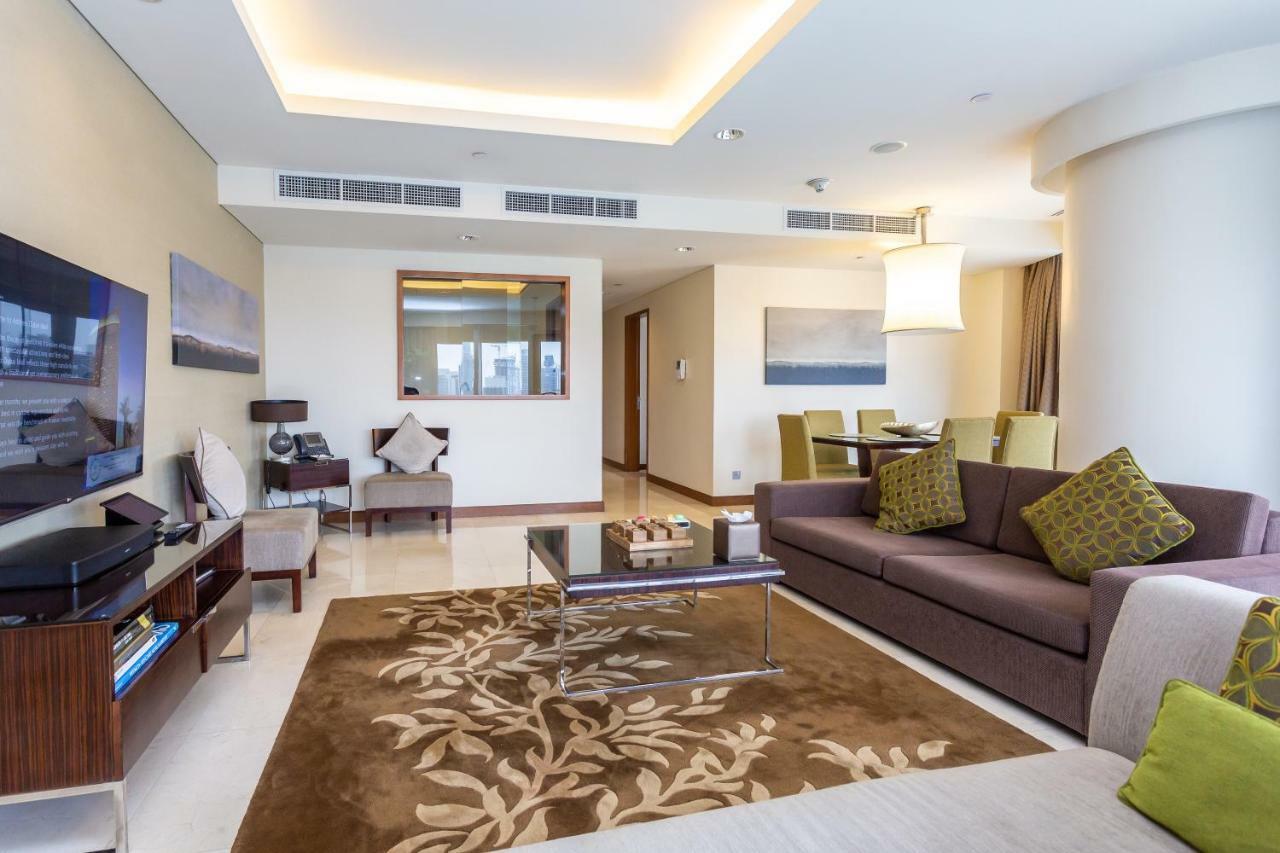 Westminster Dubai Mall Exteriör bild A living room in a typical apartment